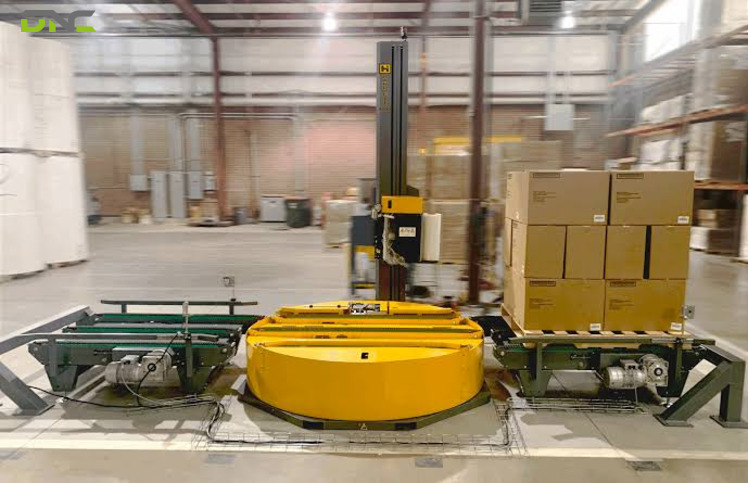 Turntable vs Rotary Arm Stretch Wrapper | DNC Automation 3 Floor Space and Ceiling Clearance: The Only Hard Eliminator