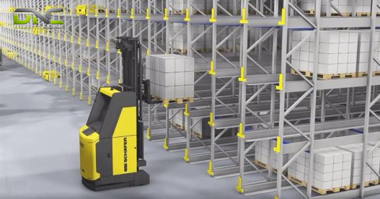 AGV Pallet Transport at End of Line: Palletizer → Stretch Wrapper → Dock